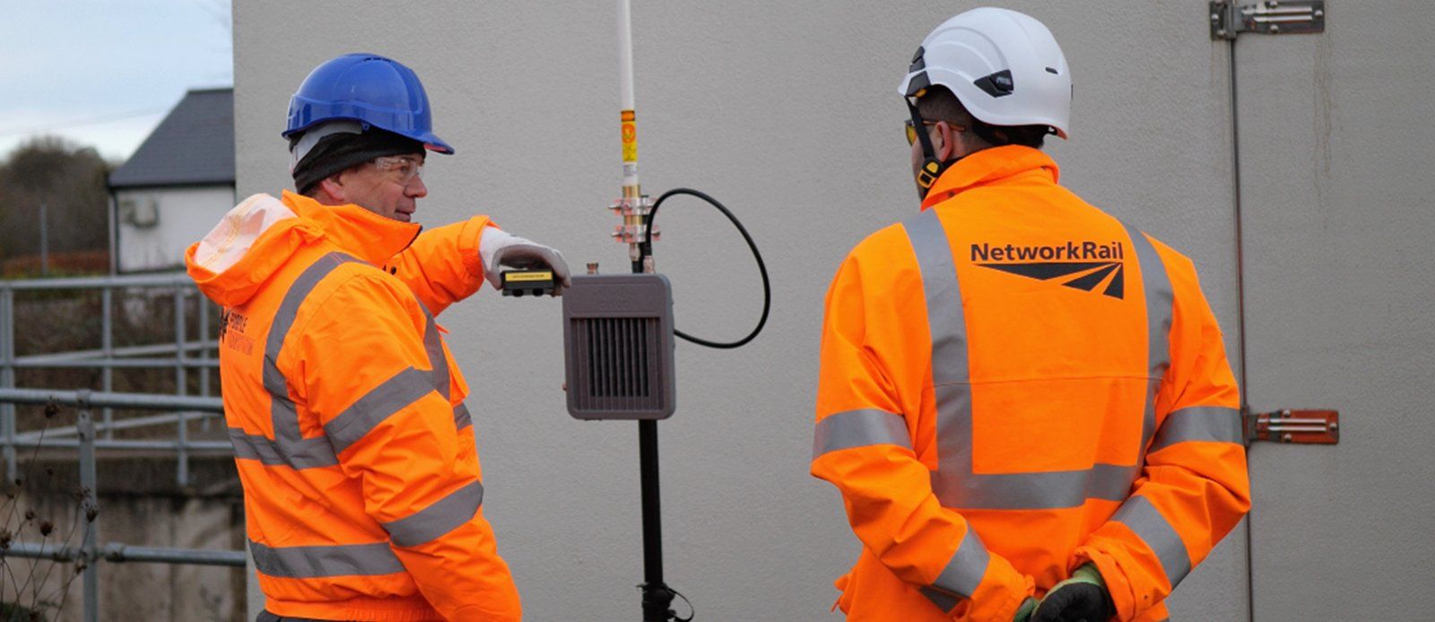 Network Rail engineers with a SIYTE sensor at Chipping Sodbury